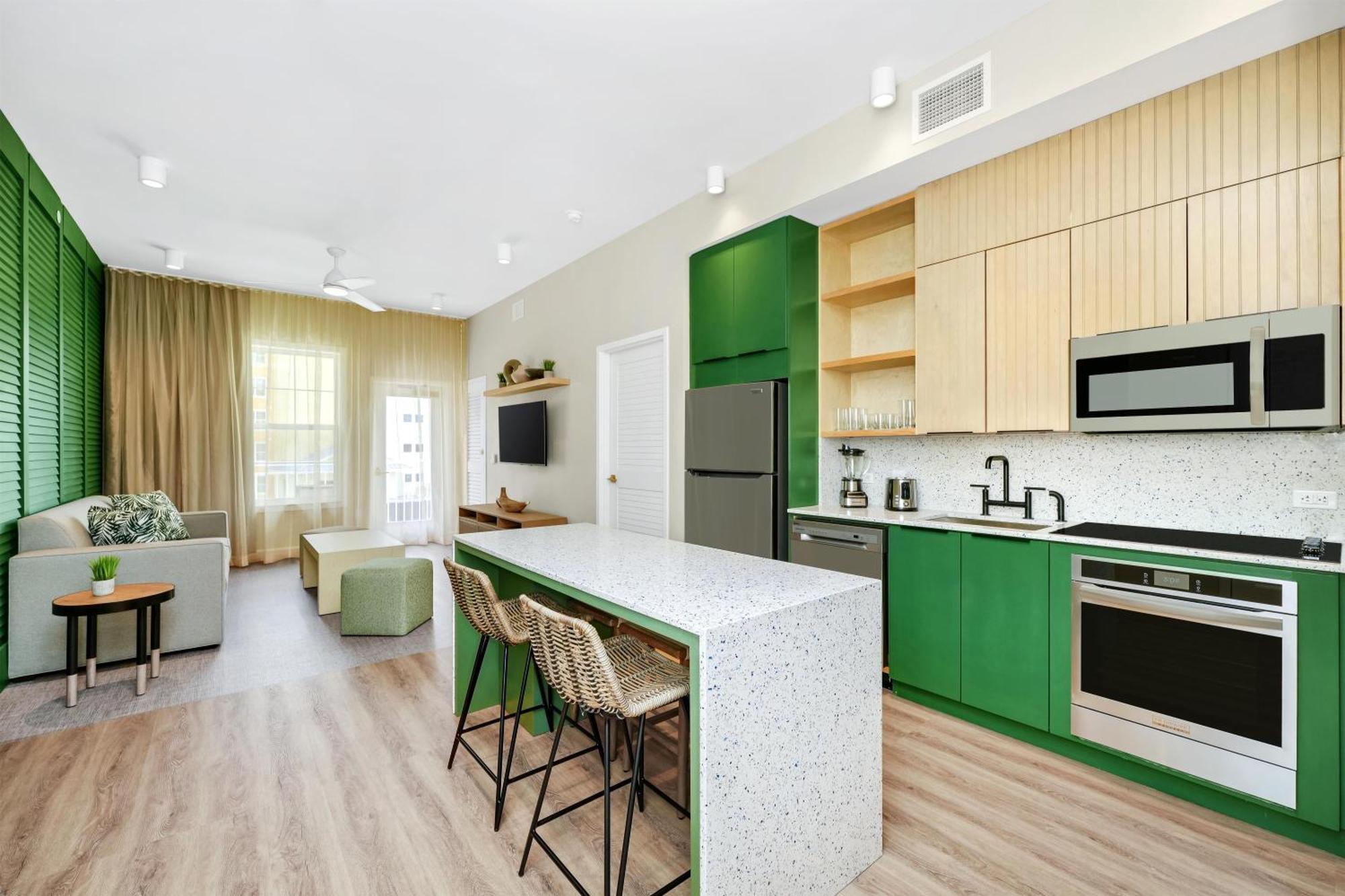 Corner Suite with King Bed, Sofa Bed, Kitchen and Balcony